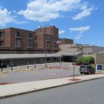 "File:Somerville Hospital, Somerville MA.jpg" by John Phelan is licensed under CC BY-SA 3.0
